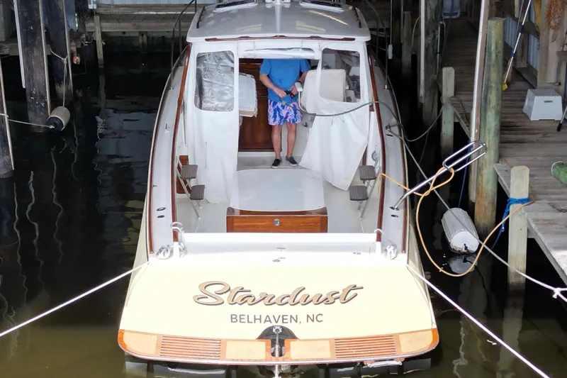 Stardust Yacht Photos Pics 1996 Hinckley Picnic Boat "Stardust" docked in Belhaven, NC marina.