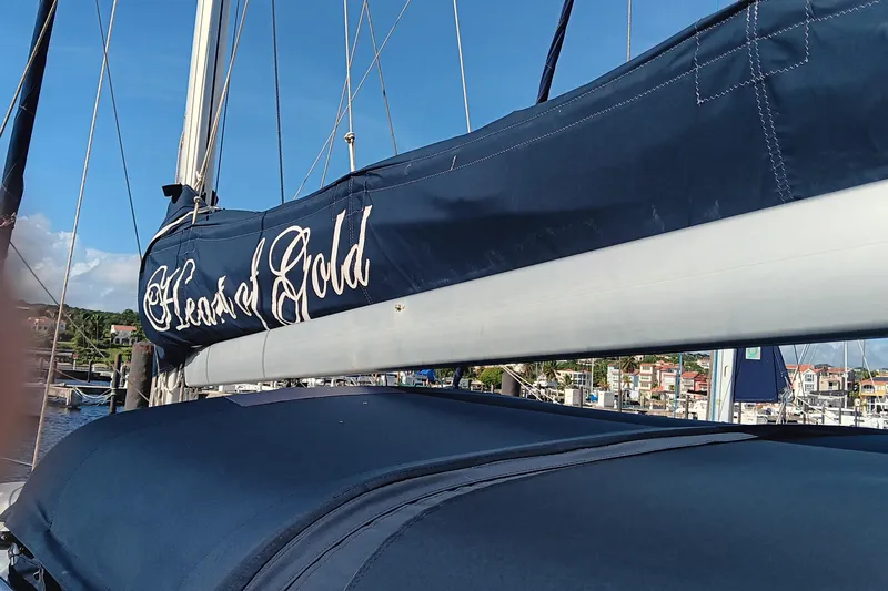 Heart Of Gold Yacht Photos Pics Sailboat with "Heart of Gold" sail cover, Hunter 450, 1998 model, docked in marina.