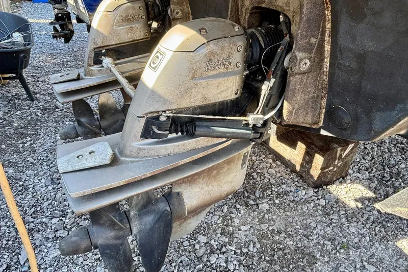  Yacht Photos Pics 2007 Formula 400 Super Sport boat engine with dual propellers on gravel surface.