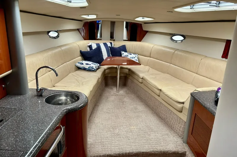  Yacht Photos Pics Luxurious interior of 2007 Formula 400 Super Sport yacht with plush seating and kitchenette.