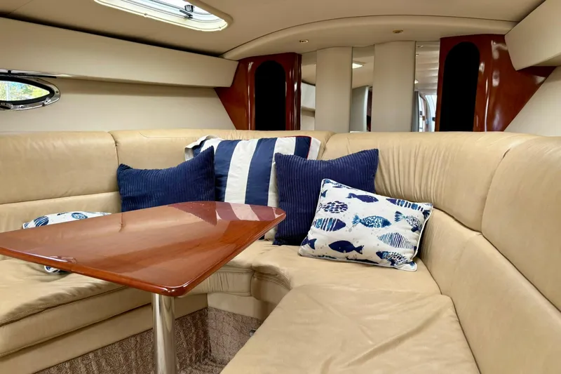  Yacht Photos Pics Luxurious interior of a 2007 Formula 400 Super Sport yacht with plush seating and decorative pillows.