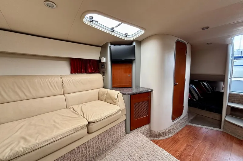  Yacht Photos Pics Interior of 2007 Formula 400 Super Sport yacht with beige seating and wood accents.