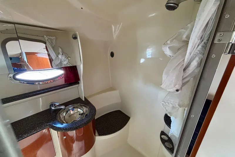  Yacht Photos Pics 2007 Formula 400 Super Sport yacht bathroom with sink, mirror, and shower area.