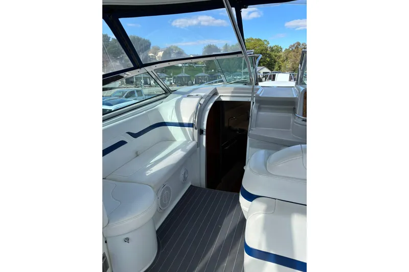  Yacht Photos Pics 2007 Formula 400 Super Sport boat interior with white seating and blue accents.