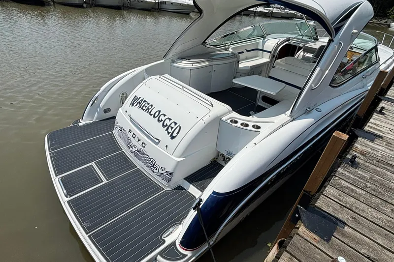  Yacht Photos Pics 2007 Formula 400 Super Sport boat docked, featuring spacious deck and sleek design.