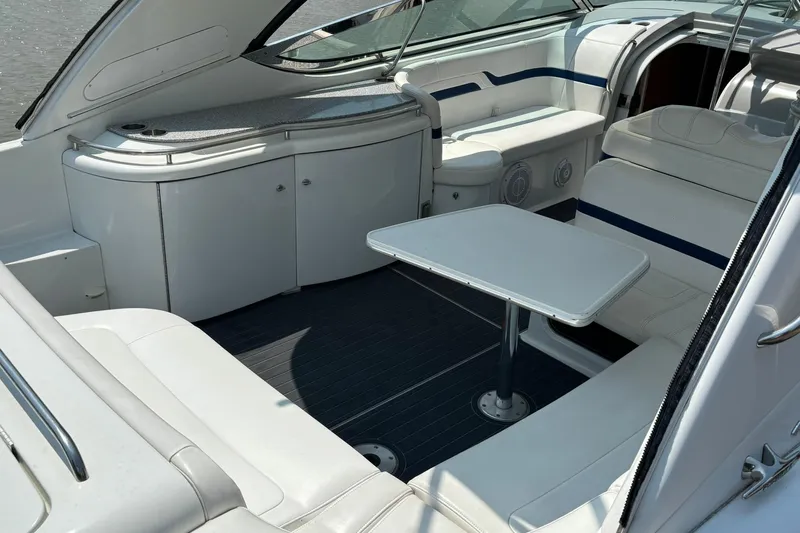  Yacht Photos Pics 2007 Formula 400 Super Sport boat interior with white seating and table.