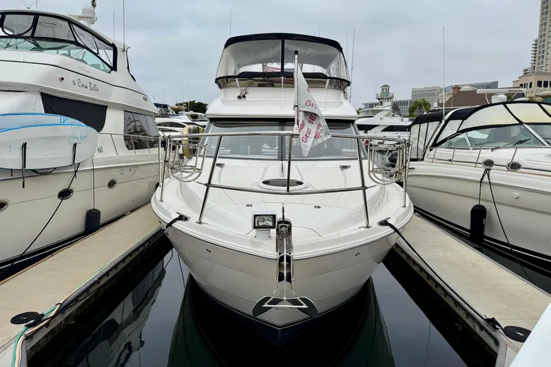  Yacht Photos Pics 2014 Meridian 391 Sedan yacht docked at marina, surrounded by other boats.