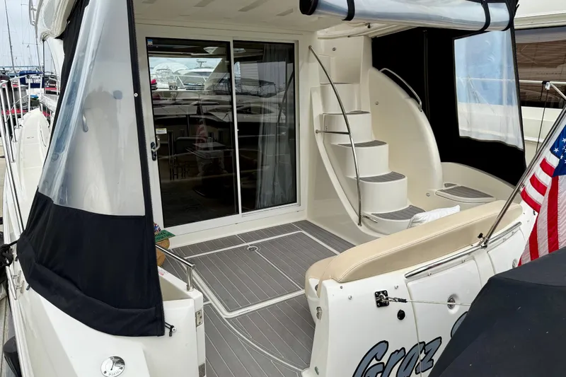  Yacht Photos Pics 2014 Meridian 391 Sedan yacht with elegant deck and spiral staircase.