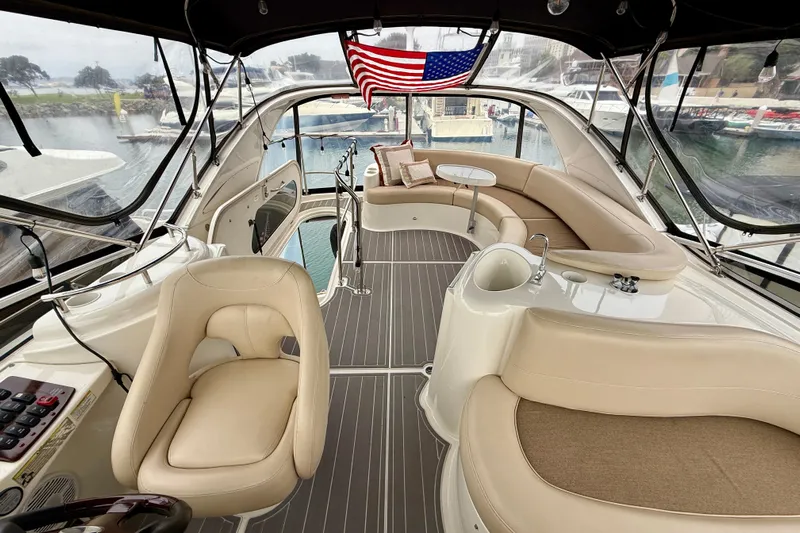  Yacht Photos Pics Luxurious interior of 2014 Meridian 391 Sedan yacht with elegant seating and helm.