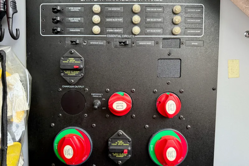  Yacht Photos Pics Battery management panel on a 2014 Meridian 391 Sedan boat, featuring essential circuit controls.