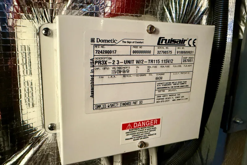  Yacht Photos Pics Electrical control box on a 2014 Meridian 391 Sedan, featuring Dometic Cruisair specifications.