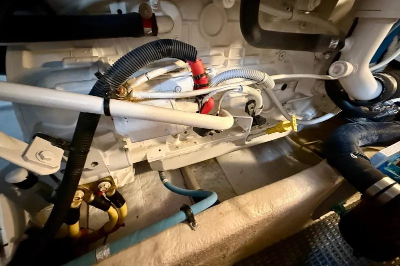  Yacht Photos Pics Engine room of a 2014 Meridian 391 Sedan, showcasing various hoses and components.