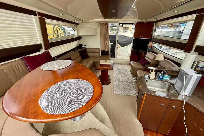  Yacht Photos Pics Luxurious interior of a 2014 Meridian 391 Sedan yacht with elegant furnishings and modern amenities.