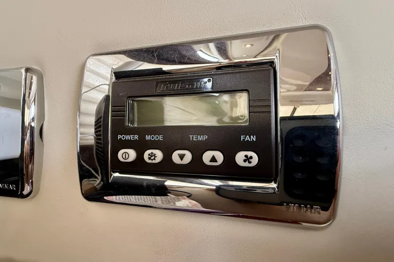  Yacht Photos Pics Digital control panel on a 2014 Meridian 391 Sedan yacht, featuring power, mode, temp, and fan settings.
