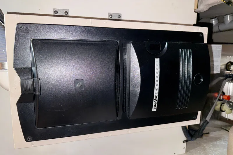  Yacht Photos Pics Built-in InterVac vacuum system in 2014 Meridian 391 Sedan yacht.