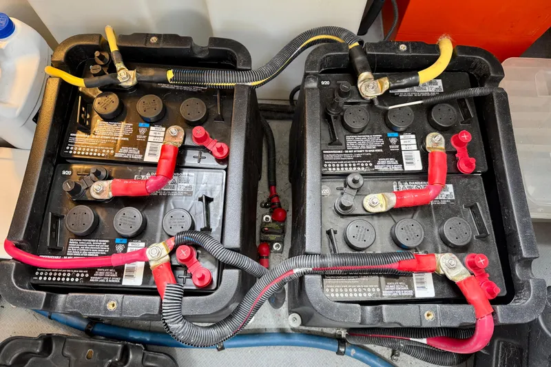  Yacht Photos Pics Two connected marine batteries in a 2014 Meridian 391 Sedan engine compartment.