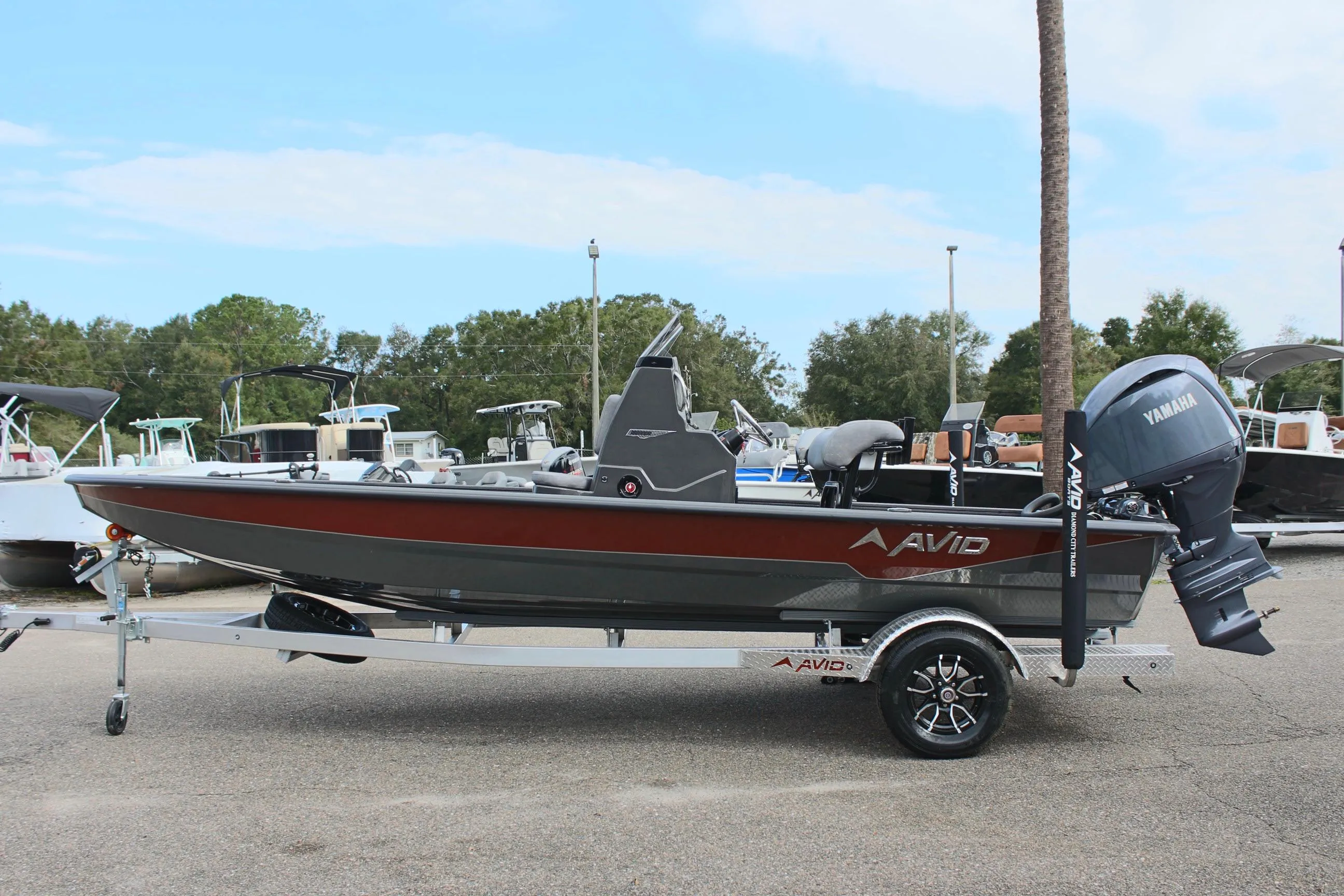 2025 Avid 21 FSX boat on trailer with Yamaha outboard motor.