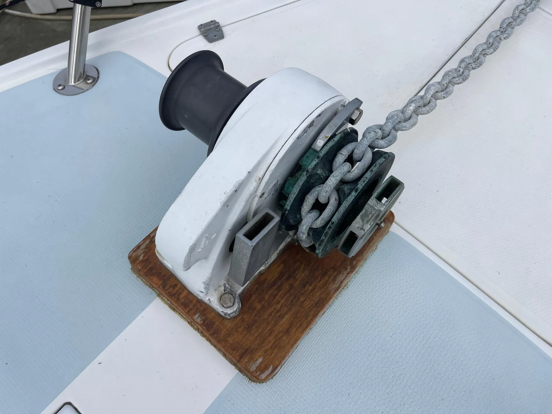 Anchor windlass on 1984 Catalina 30 sailboat deck.