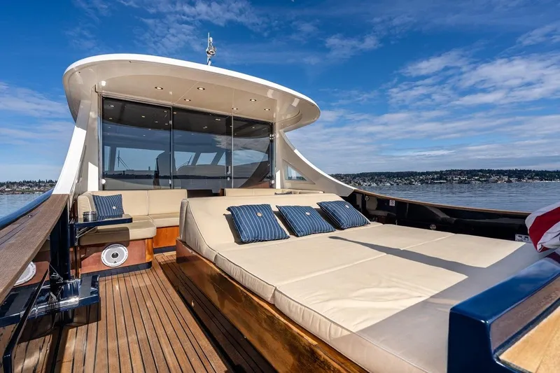  Yacht Photos Pics Luxurious 2022 Filippetti Classic 54 yacht with spacious deck and elegant seating.