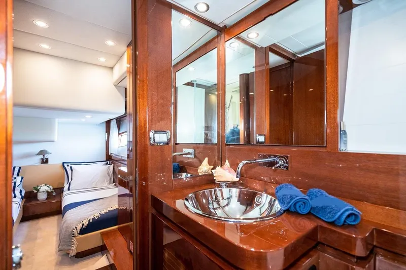  Yacht Photos Pics Luxurious 2022 Filippetti Classic 54 yacht interior with elegant wood finishes and modern amenities.