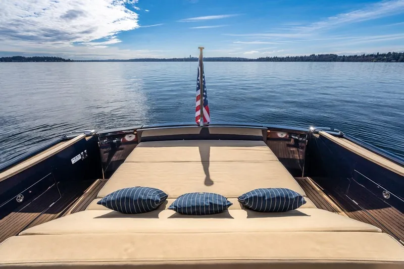  Yacht Photos Pics Luxurious 2022 Filippetti Classic 54 yacht with sun deck and scenic ocean view.