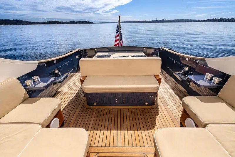  Yacht Photos Pics Luxury Filippetti Classic 54 yacht deck with seating, 2022 model, on calm waters.