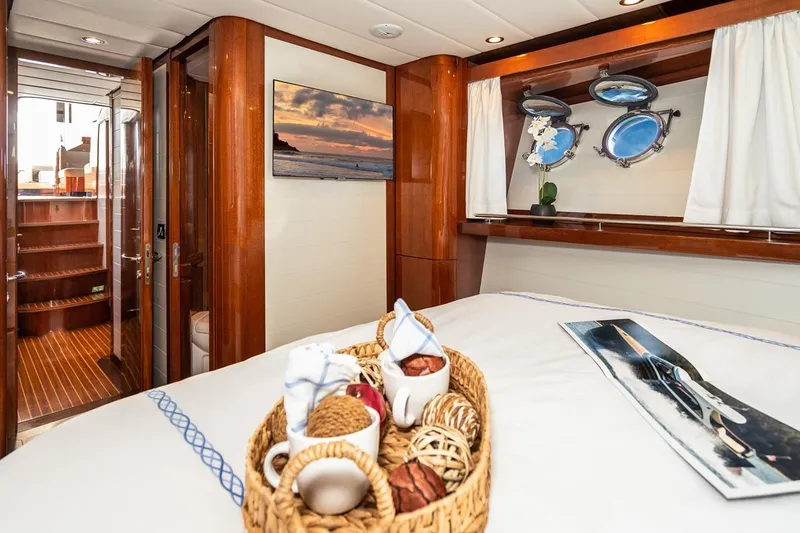  Yacht Photos Pics Luxurious interior of 2022 Filippetti Classic 54 yacht with elegant wood finishes.