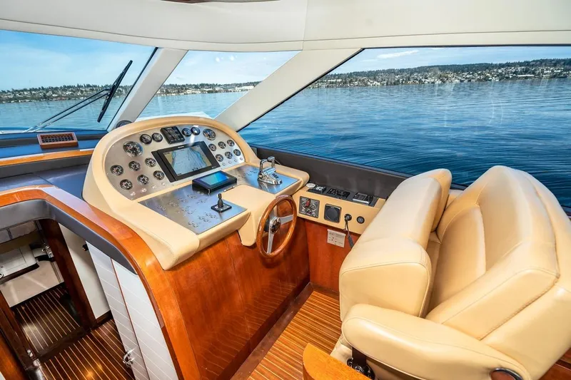  Yacht Photos Pics Luxurious helm of 2022 Filippetti Classic 54 yacht with panoramic water view.