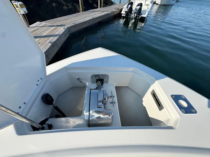  Yacht Photos Pics 2023 Sailfish 312 CC boat anchor compartment at dockside.