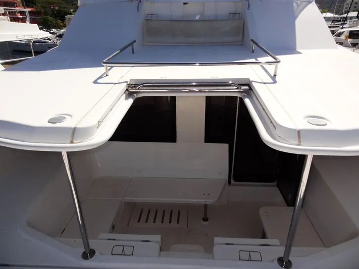 Makin Wind Yacht Photos Pics 2017 Leopard 51 Powercat yacht deck with seating area.