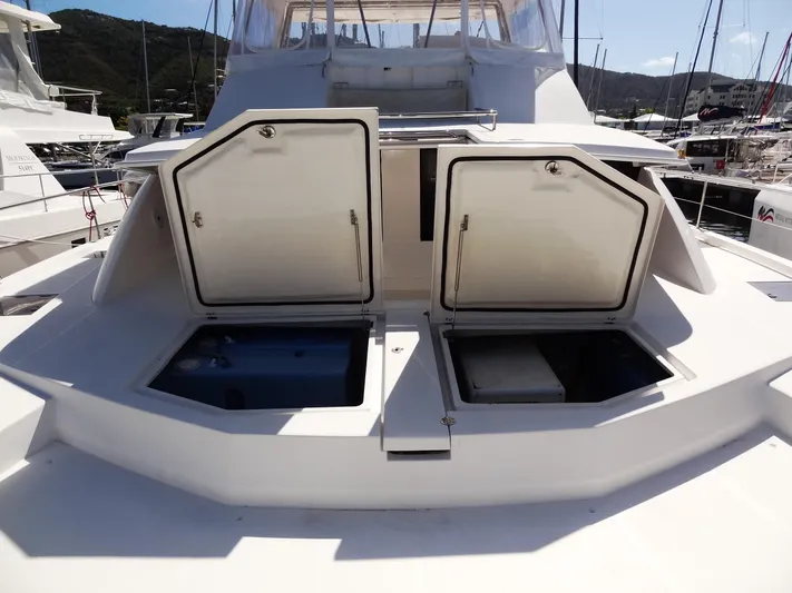 Makin Wind Yacht Photos Pics 2017 Leopard 51 Powercat with open storage compartments on deck.