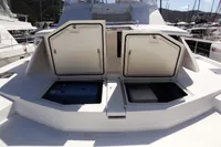 2017 Leopard 51 Powercat with open storage compartments on deck.