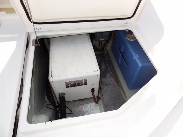 Makin Wind Yacht Photos Pics 2017 Leopard 51 Powercat engine compartment with equipment and storage.