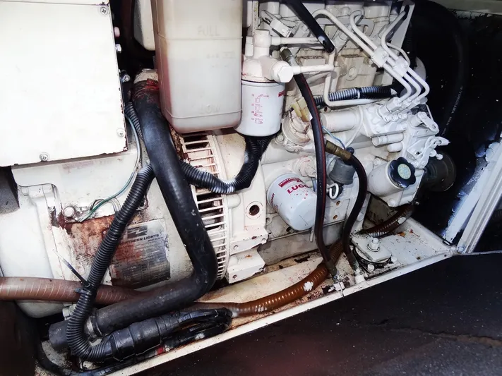 Makin Wind Yacht Photos Pics Engine compartment of a 2017 Leopard 51 Powercat with visible hoses and components.