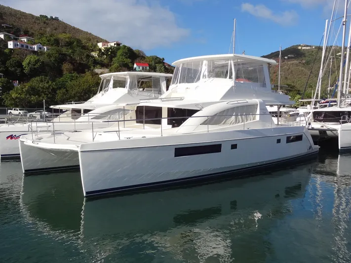Makin Wind Yacht Photos Pics 2017 Leopard 51 Powercat yacht docked in a marina.