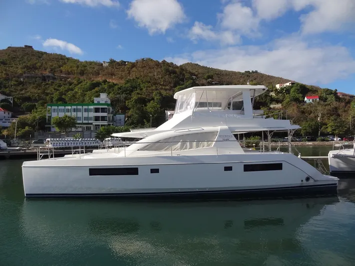 Makin Wind Yacht Photos Pics 2017 Leopard 51 Powercat yacht docked in a marina.
