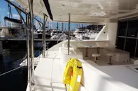 2017 Leopard 51 Powercat yacht deck with seating area and marina view.