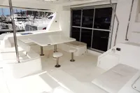 2017 Leopard 51 Powercat yacht interior with seating and dining area.