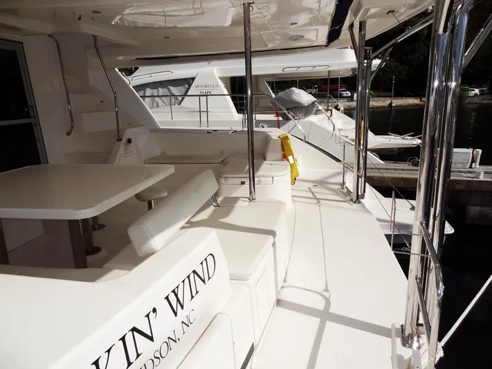 Makin Wind Yacht Photos Pics 2017 Leopard 51 Powercat yacht with spacious deck and seating area.