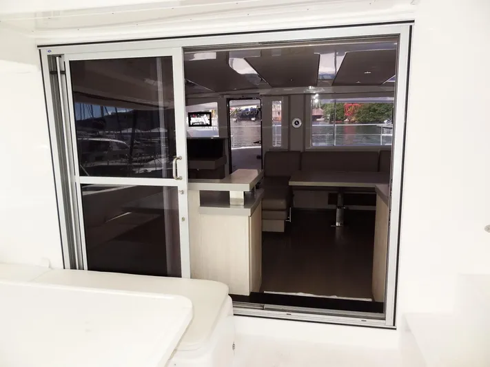Makin Wind Yacht Photos Pics Interior view of 2017 Leopard 51 Powercat through sliding glass door.