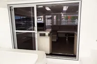 Interior view of 2017 Leopard 51 Powercat through sliding glass door.