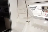 Staircase on 2017 Leopard 51 Powercat yacht with stainless steel handrail.