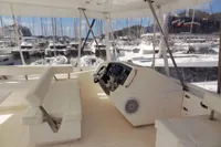 2017 Leopard 51 Powercat helm station with marina view.