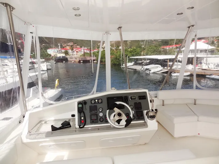 Makin Wind Yacht Photos Pics Leopard 51 Powercat 2017 helm station with marina view.