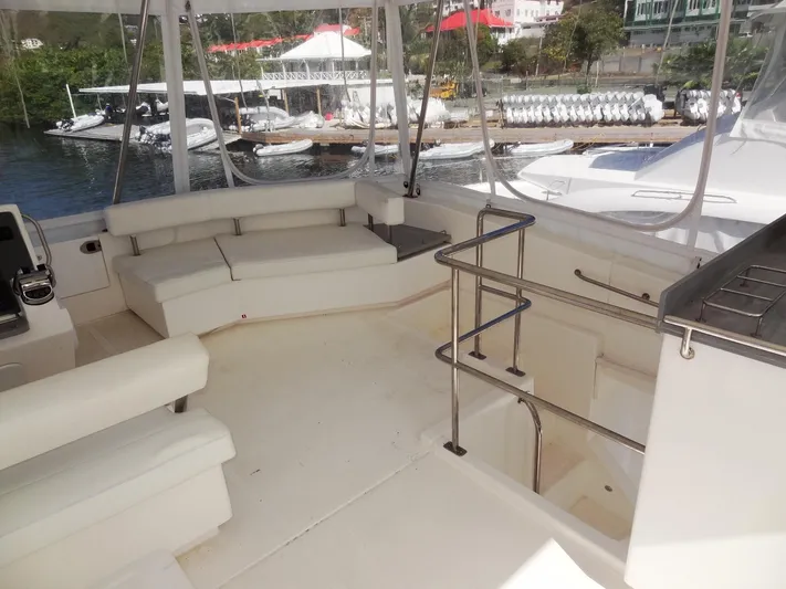 Makin Wind Yacht Photos Pics 2017 Leopard 51 Powercat yacht interior with spacious seating area and marina view.