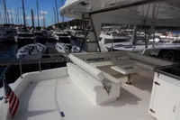 2017 Leopard 51 Powercat yacht with spacious deck and marina view.