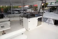Leopard 51 Powercat 2017 yacht with spacious outdoor seating and grill area.