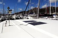 2017 Leopard 51 Powercat in a marina with solar panels on the roof.