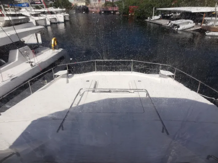 Makin Wind Yacht Photos Pics View from Leopard 51 Powercat 2017 yacht, docked at marina.