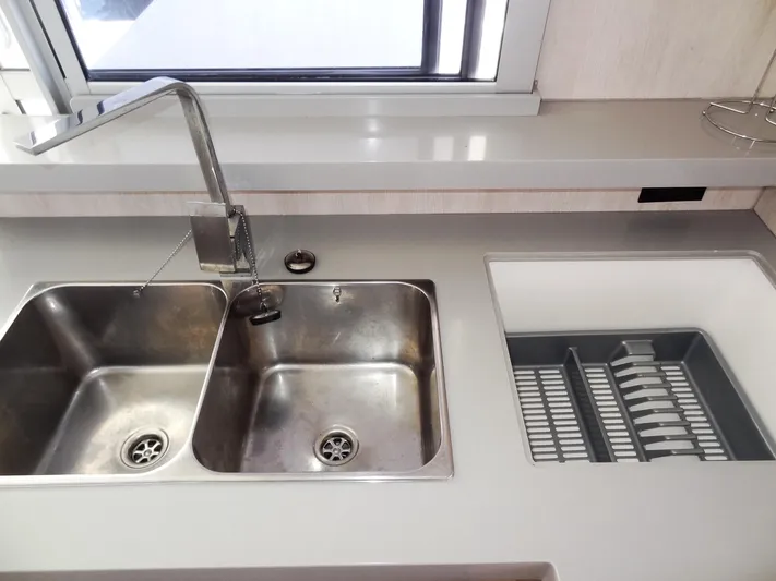 Makin Wind Yacht Photos Pics Modern kitchen sink area on a 2017 Leopard 51 Powercat yacht.